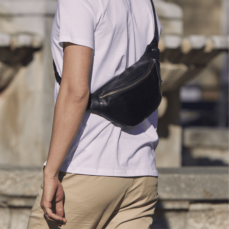 Man In White T Shirt Wearing Adax Black Leather Bum Bag
